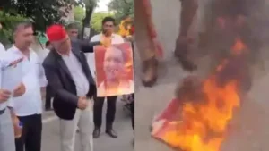 During the protest, a man, identified as party supporter Anil Verma, is purportedly seen trying