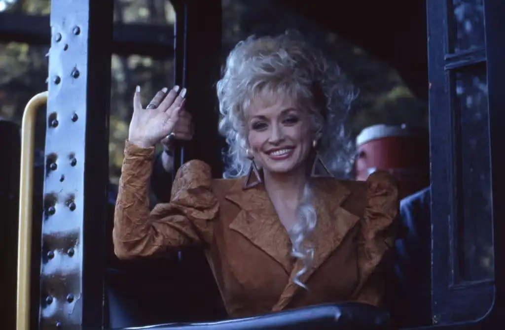 Dolly Parton grew up with 11 siblings in a two-room Tennessee cabin without electricity or running