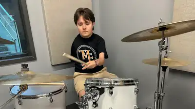 19-year-old Marcus Klepacki learned to play an acoustic drum kit with one arm