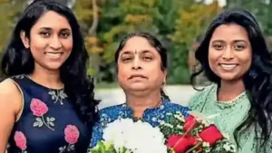 Venkata Vasamsetty (middle) has been granted bail but her immigration case continues as DHS