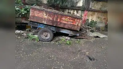 Broken pieces of the drain covers and chunks of concrete lie strewn across the spots, leaving