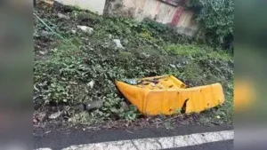 Broken pieces of the drain covers and chunks of concrete lie strewn across the spots, leaving