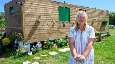 A West Sussex widow transformed £57,000 fly-tipped wasteland into a dream mini-farm with pigs