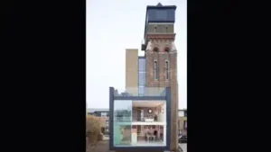 A British couple bought a derelict 85-foot, seven-storey Victorian water tower at auction