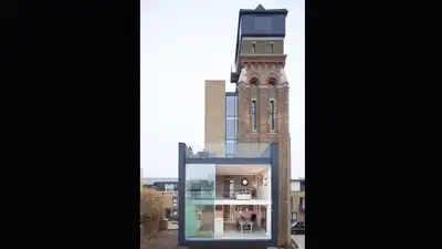 A British couple bought a derelict 85-foot, seven-storey Victorian water tower at auction