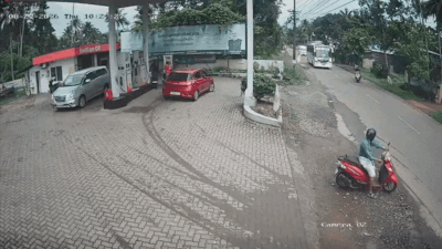 A tourist bus carrying wedding guests overturned near a petrol pump in Kakkoor