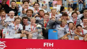 (AP Photo/Geert Vanden Wijngaert) Gold medal winners, Germany, celebrate with the trophy