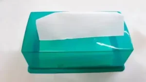Rather than buying a dedicated bag dispenser or a fabric holder, an empty box you were going