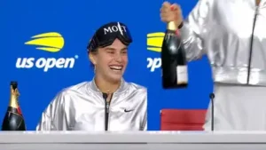 Tennis queen Aryna Sabalenka brings champagne to press conference after US Open victory