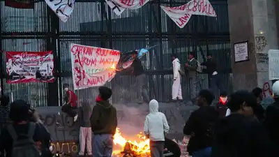 Transport services in parts of Jakarta were disrupted on Friday following overnight unrest near
