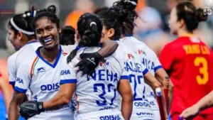 Indian players celebrate after scoring a goal against China in the FIH World Cup