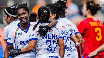 Indian players celebrate after scoring a goal against China in the FIH World Cup