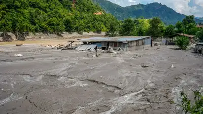 An area covered in mud and silt washed away by the devastating flash: The wider industry impact