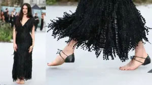 Margaret Qualley may have arrived at the red carpet in a beautiful Chanel dress, but it was