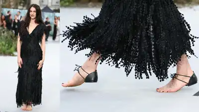 Margaret Qualley may have arrived at the red carpet in a beautiful Chanel dress, but it was