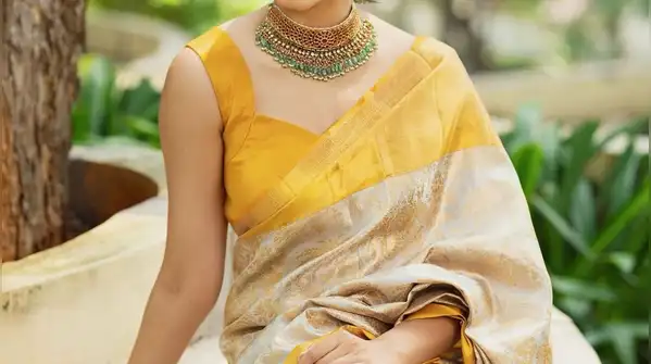 Gold borders on sarees in India are rarely ornamental