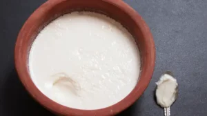 If you stir it, the curd may look strangely glossy and feel slimy, not thick, creamy and smooth