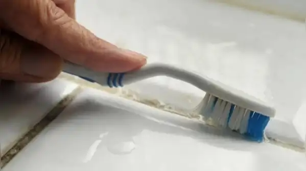 From kitchen taps to grimy grout lines, an old toothbrush can tackle dirt and buildup in spots