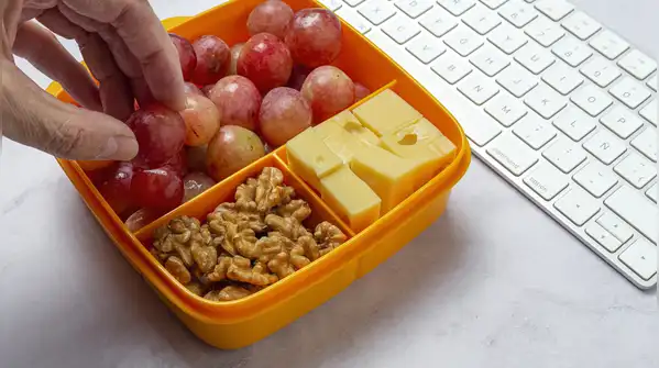 Here are some easy foods you can keep at your desk for those predictable afternoon hunger pangs