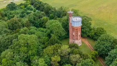 Built as a water tower after royal illnesses, this strange 1877 structure is now a luxury retreat