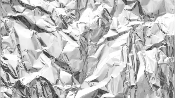 One surprisingly simple trick is to line kitchen shelves with aluminium foil