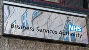 NHS pension system declared a retired worker dead and stopped paying her; she borrowed money to fly