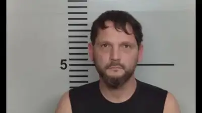 Kentucky police officer Asad Zahir arrested and charged after he was found stalking his ex over