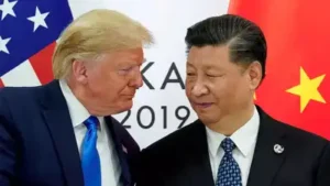 US President Donald Trump with Chinese President Xi Jinping — File: The wider industry impact