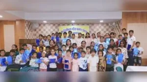 Kids participating in painting competition event in city on sunday