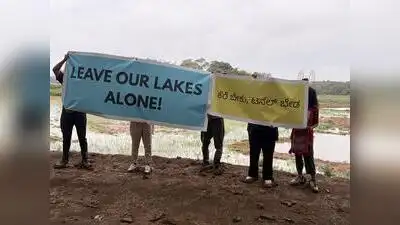 Holding banners that read ‘Leave Our Lakes Alone’ and ‘Kere Beku, Tunnel Beda’ We want lakes