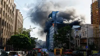Smoke rises in the aftermath of a Russian jet-powered drone strike, amid Russia's attack