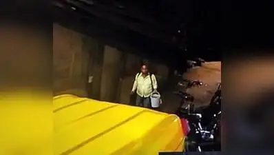 CCTV footage shows a man carrying a bucket approaching Gajanan Damone’s house at 1.58am