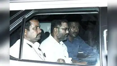 Dharwad tahsildar Sachchidanand Kachanur (centre) was arrested by the Karnataka Lokayukta