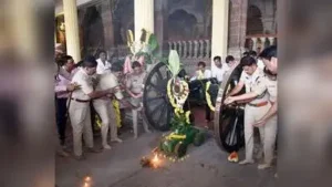 Mysuru police perform puja to cannons at the Mysuru Palace Friday