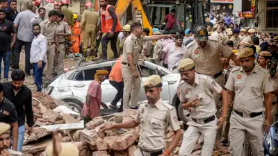 Delhi Police are actively searching for Shubham Tyagi, an absconding accused in the building