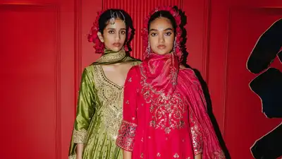I don't think the lehenga is losing its place, but the Indian wedding wardrobe has certainly