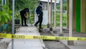 Three people were killed and four others injured after an argument escalated into gunfire