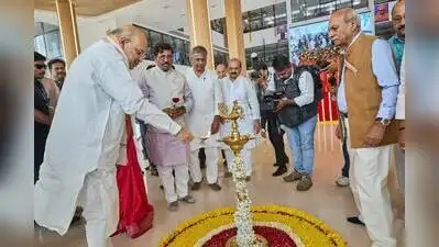 Union home minister Amit Shah lights the lamp to inaugurate the KAHER JGMM Medical College
