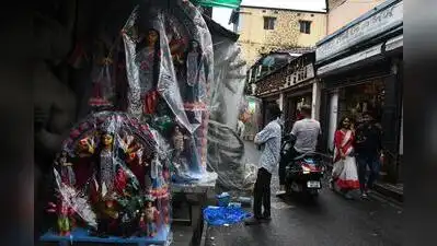 Idols wrapped in plastic sheets at Kumartuli on Thursday: The wider industry impact
