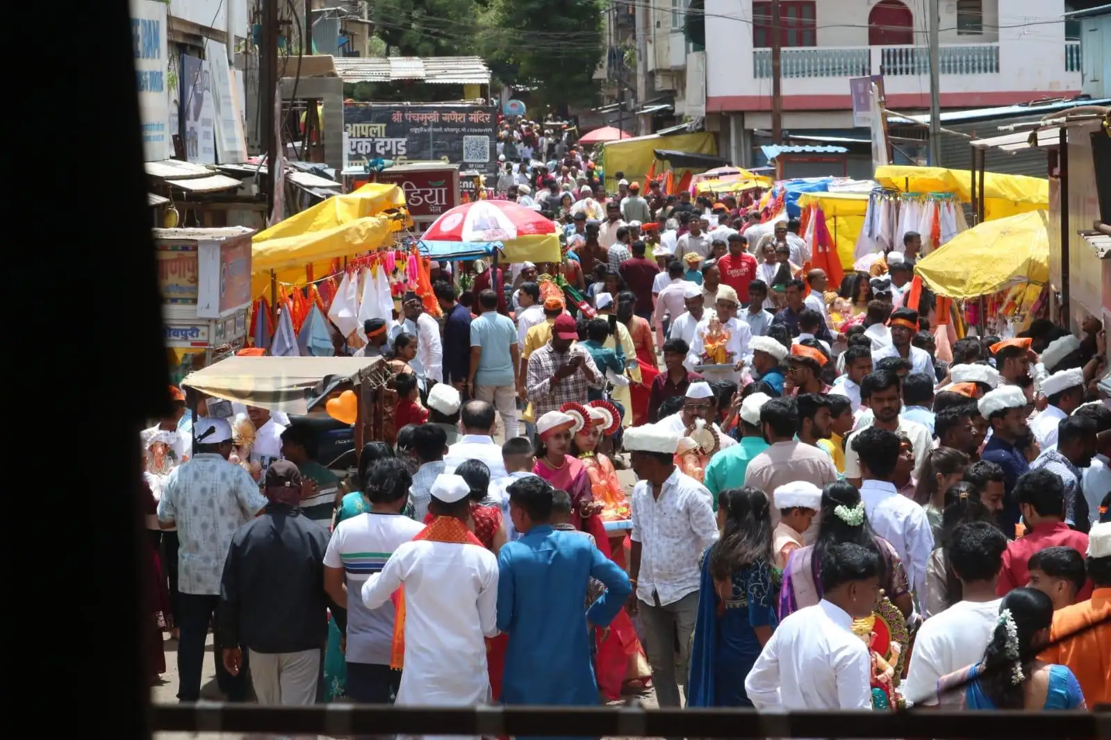 Many carried idols in their arms, while children proudly escorted Bappa home amid chants