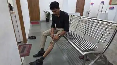 A Food and Drug Administration officer was injured after he was allegedly pushed by a man