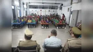 Kaushambi cops interacting with students to create cyber awareness
