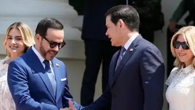 Colombian President Abelardo De La Espriella shakes hands with US Secretary of State Marco