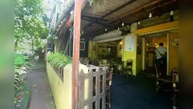 A cafe on the ground floor of a Golf Green house