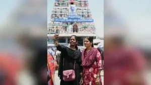 Mobile phone ban receives mixed response from devotees