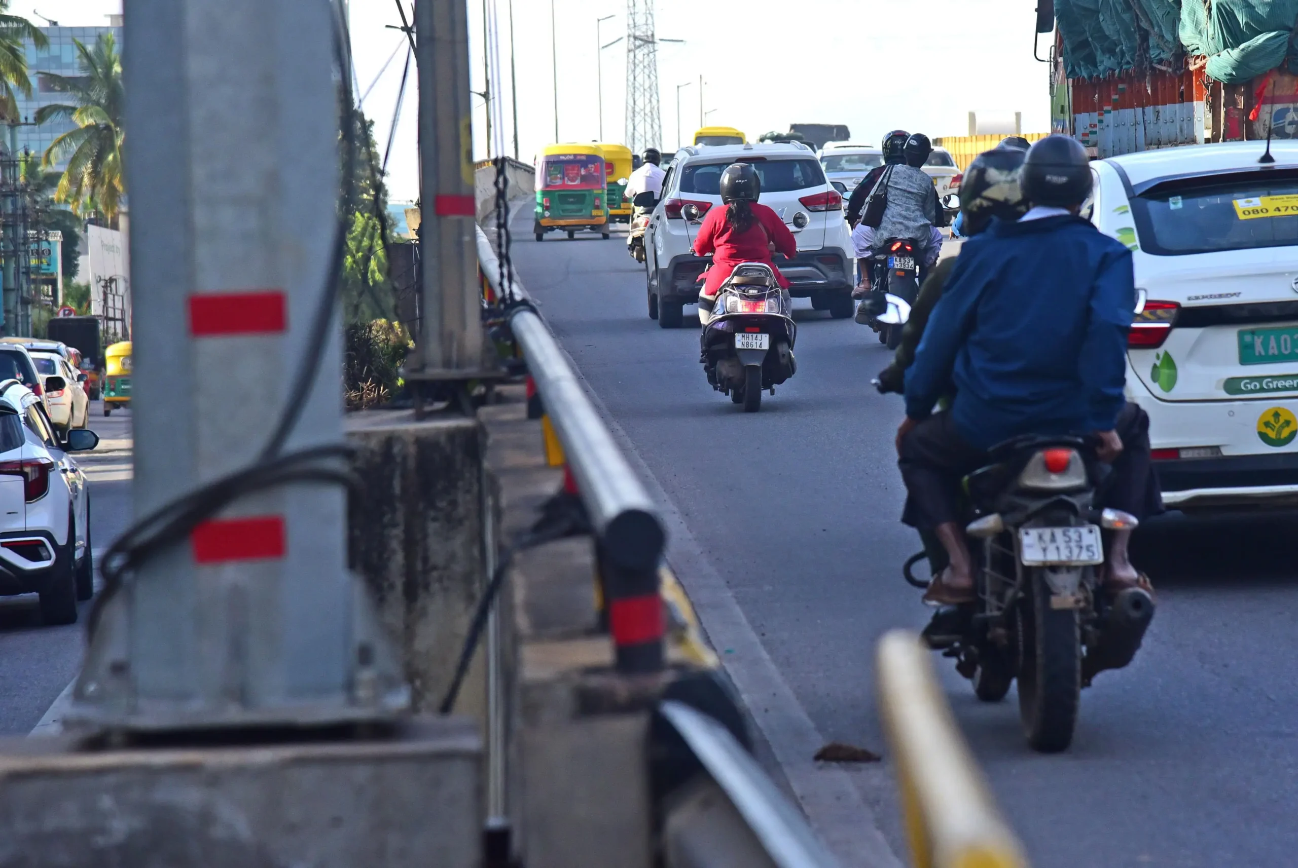 Two wheelers take the express way flyover on Airport road as restriction relaxed a bit