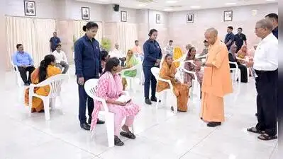 Chief Minister Yogi Adityanath interacts with people during Janata Darshan at his residence