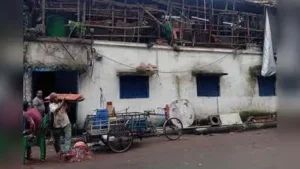 The illegal structure on the roof of the Ward 39 councillor’s office is demolished by KMC