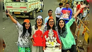 By evening, roads came alive with music and devotional songs as devotees brought Bappa