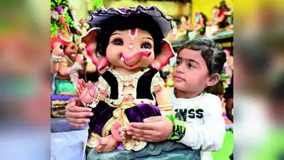 By evening, roads came alive with music and devotional songs as devotees brought Bappa